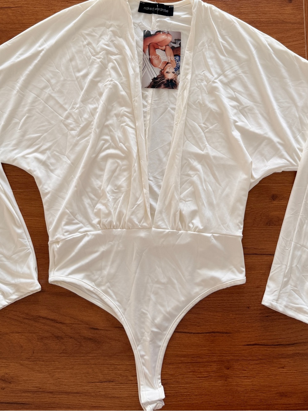 naked wardrobe White Plunge Long Sleeve Bodysuit